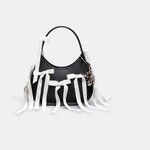 Win The Coachtopia Ergo Bag in Leather with Allover Bows from Let's Get Posh