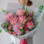 $10 off All Specially Made Mothers Day Flowers and Free Premium Wrapped Rose Valued at $15