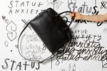 Win 1 of 2 Status Anxiety Leather Satchels Worth $299 from Man of Many