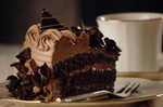 Bris: Only $6 For a Heavenly Cake and Coffee from "Coffee and Chocolate", Queens Plaza. Save 51%