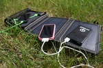Win a 14 Watt Portable Solar Charger w/ 4,000mAh Battery from SunJack