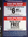 Free Garlic Bread with Pizza Purchase at Domino's Online Order Only
