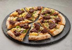 Buy 1 Premium or Traditional Pizza (Excludes Half 'n' Half), Get 1 Large Traditional/Value Max/Value Pizza from $1 @ Domino's